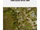 Aerial view showing home location and surrounding landscape at 4390 Saxon Dr, New Smyrna Beach, FL 32169