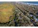 Aerial view showing property location near water and ocean at 4390 Saxon Dr, New Smyrna Beach, FL 32169
