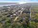 Aerial view of property location near the coast, showcasing surrounding landscape and neighborhood at 4390 Saxon Dr, New Smyrna Beach, FL 32169