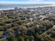 Aerial view showing property location near ocean and houses at 4390 Saxon Dr, New Smyrna Beach, FL 32169