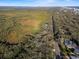 Aerial view of property with ocean and nature views at 4390 Saxon Dr, New Smyrna Beach, FL 32169