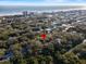 Aerial view showing property location near water and houses at 4390 Saxon Dr, New Smyrna Beach, FL 32169