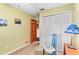 Bright bedroom with wood door and built-in closet at 4390 Saxon Dr, New Smyrna Beach, FL 32169