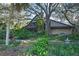A-frame home nestled in a lush garden at 4390 Saxon Dr, New Smyrna Beach, FL 32169