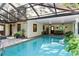 Relaxing pool area with patio and outdoor access at 4390 Saxon Dr, New Smyrna Beach, FL 32169