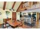 Open kitchen with granite counters, stone breakfast bar and modern appliances at 4390 Saxon Dr, New Smyrna Beach, FL 32169