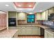 Kitchen with granite countertops and stainless steel appliances at 4390 Saxon Dr, New Smyrna Beach, FL 32169