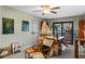 Home office with a desk, chair, and access to a balcony at 4390 Saxon Dr, New Smyrna Beach, FL 32169