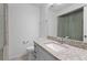 Bathroom with granite countertop and single sink vanity at 440 Macgregor Rd, Winter Springs, FL 32708