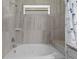 Soaking tub with jets and tile surround at 440 Macgregor Rd, Winter Springs, FL 32708