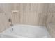 Soaking tub with jets and tile surround at 440 Macgregor Rd, Winter Springs, FL 32708