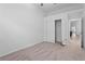 Bedroom with closet and view of the living room at 440 Macgregor Rd, Winter Springs, FL 32708