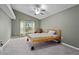 Spacious bedroom with carpeted floor and ceiling fan at 440 Macgregor Rd, Winter Springs, FL 32708
