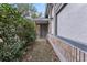 Inviting front entrance with landscaping and walkway at 440 Macgregor Rd, Winter Springs, FL 32708