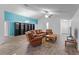 Spacious living room with hardwood floors and leather furniture at 440 Macgregor Rd, Winter Springs, FL 32708