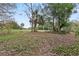 Open lot with mature trees and natural landscaping at 440 Macgregor Rd, Winter Springs, FL 32708