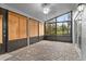 Spacious screened porch with paver floor and nature views at 440 Macgregor Rd, Winter Springs, FL 32708