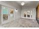 Bright screened porch with paver tile floor and access to backyard at 440 Macgregor Rd, Winter Springs, FL 32708