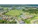 Luxury homes surrounding golf course and lake at 5106 Nw 35Th Lane Rd, Ocala, FL 34482