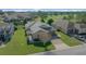 Aerial view of a house and neighborhood with golf course views at 5106 Nw 35Th Lane Rd, Ocala, FL 34482