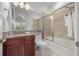 Bathroom with tub, shower, and granite countertop at 5106 Nw 35Th Lane Rd, Ocala, FL 34482