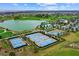 Tennis, pickleball, pool, and golf course at 5106 Nw 35Th Lane Rd, Ocala, FL 34482