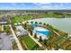 Aerial view of community pool and palm trees at 5106 Nw 35Th Lane Rd, Ocala, FL 34482
