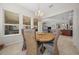 Open dining room with a view into the living area and kitchen at 5106 Nw 35Th Lane Rd, Ocala, FL 34482