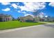 Single story home with front yard landscaping and a tree at 5106 Nw 35Th Lane Rd, Ocala, FL 34482