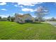 Single-story home with landscaped yard and attached garage at 5106 Nw 35Th Lane Rd, Ocala, FL 34482