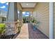 Brick paved front porch with sitting area at 5106 Nw 35Th Lane Rd, Ocala, FL 34482