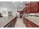 Modern kitchen with granite countertops and stainless steel appliances at 5106 Nw 35Th Lane Rd, Ocala, FL 34482