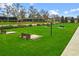 Community lawn area with cornhole and other games at 5106 Nw 35Th Lane Rd, Ocala, FL 34482
