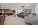 Open concept living room with kitchen and screened porch views at 5106 Nw 35Th Lane Rd, Ocala, FL 34482
