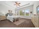 Spacious main bedroom with wood flooring and lots of natural light at 5106 Nw 35Th Lane Rd, Ocala, FL 34482