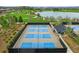 Expansive pickleball courts with lake views at 5106 Nw 35Th Lane Rd, Ocala, FL 34482