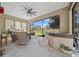Spacious screened lanai with hot tub and comfortable seating area at 5106 Nw 35Th Lane Rd, Ocala, FL 34482