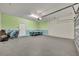 Spacious garage with air hockey table at 5437 Misty Oak Cir, Davenport, FL 33837