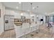 Modern kitchen with stainless steel appliances and an island at 5437 Misty Oak Cir, Davenport, FL 33837