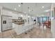 Modern kitchen with stainless steel appliances and an island at 5437 Misty Oak Cir, Davenport, FL 33837