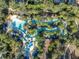Aerial view of a resort-style lazy river pool in a community at 5437 Misty Oak Cir, Davenport, FL 33837