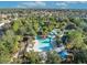 Aerial view of a resort-style lazy river pool in a community at 5437 Misty Oak Cir, Davenport, FL 33837