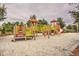 playground with climbing structures and slide at 5437 Misty Oak Cir, Davenport, FL 33837