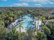 Large resort-style pool with multiple areas and lounge chairs at 5437 Misty Oak Cir, Davenport, FL 33837