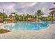 Resort-style pool with a water slide and lounge chairs at 5437 Misty Oak Cir, Davenport, FL 33837