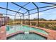 Relaxing screened pool and spa area at 5437 Misty Oak Cir, Davenport, FL 33837