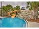 Orange water slide at the community pool at 5437 Misty Oak Cir, Davenport, FL 33837
