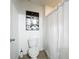 Simple bathroom with toilet and shower at 6163 Forest Ridge Way, Winter Haven, FL 33881