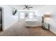 Bright bedroom featuring a king-size bed and ceiling fan at 6163 Forest Ridge Way, Winter Haven, FL 33881
