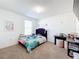 Bright bedroom with a comfortable bed and plenty of space for storage at 6163 Forest Ridge Way, Winter Haven, FL 33881